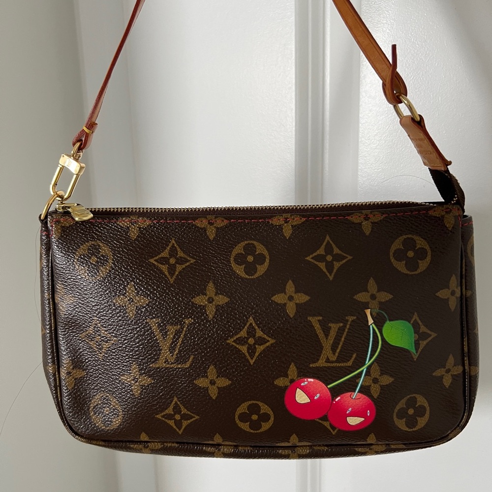 Limited edition LV cherry pouchette. Excellent condition.